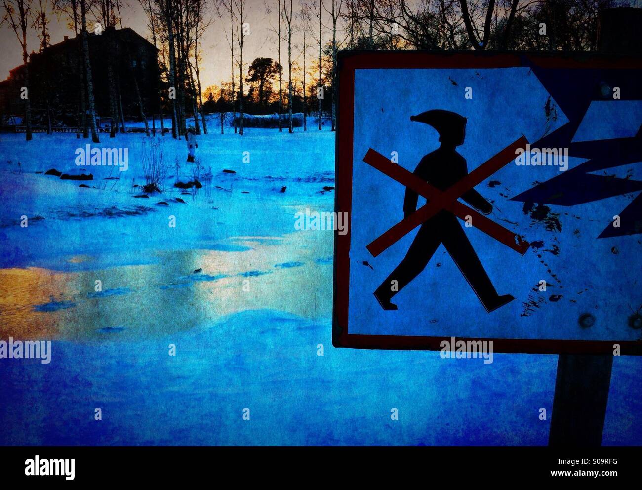 A warning sign about thin ice Stock Photo