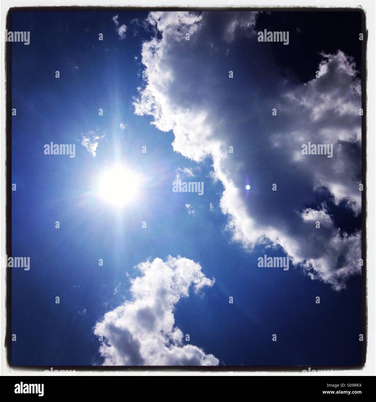 Sunny blue sky Stock Photo - Alamy