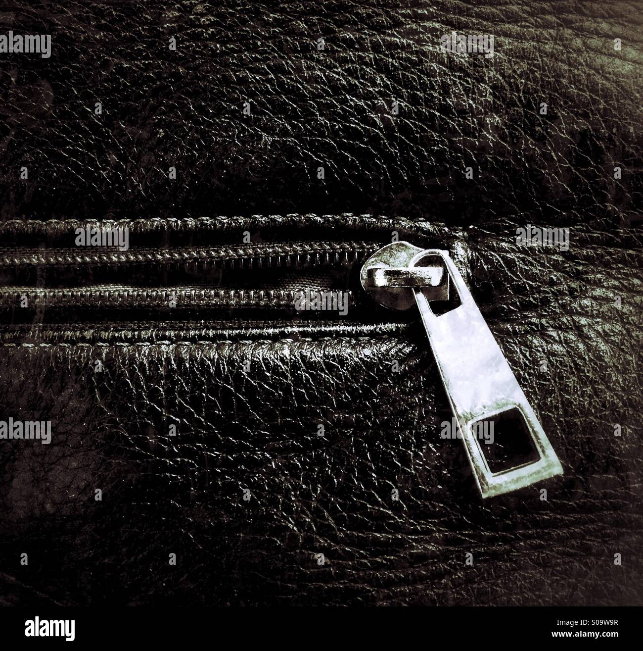 Zipper On Black Leather Stock Photo Alamy