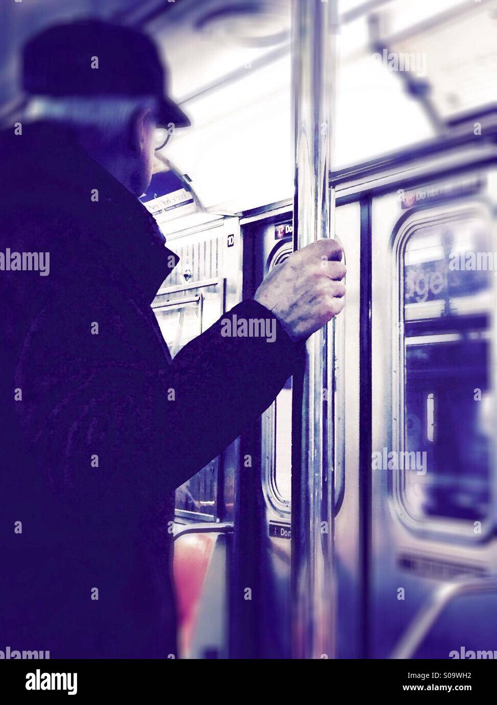 Passenger on NYC subway - Smartphone Captured Stock Image