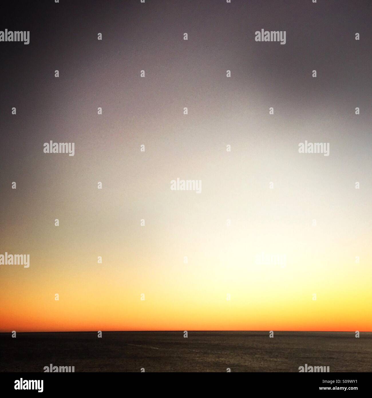 Sunset over the ocean. Manhattan beach, California USA - Smartphone Captured Stock Image