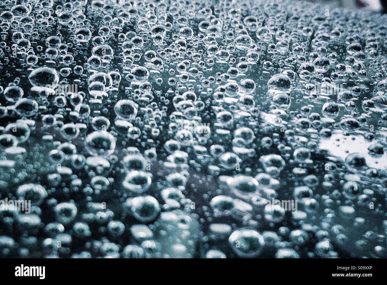 Water droplets on metallic surface of the car Stock Photo Alamy