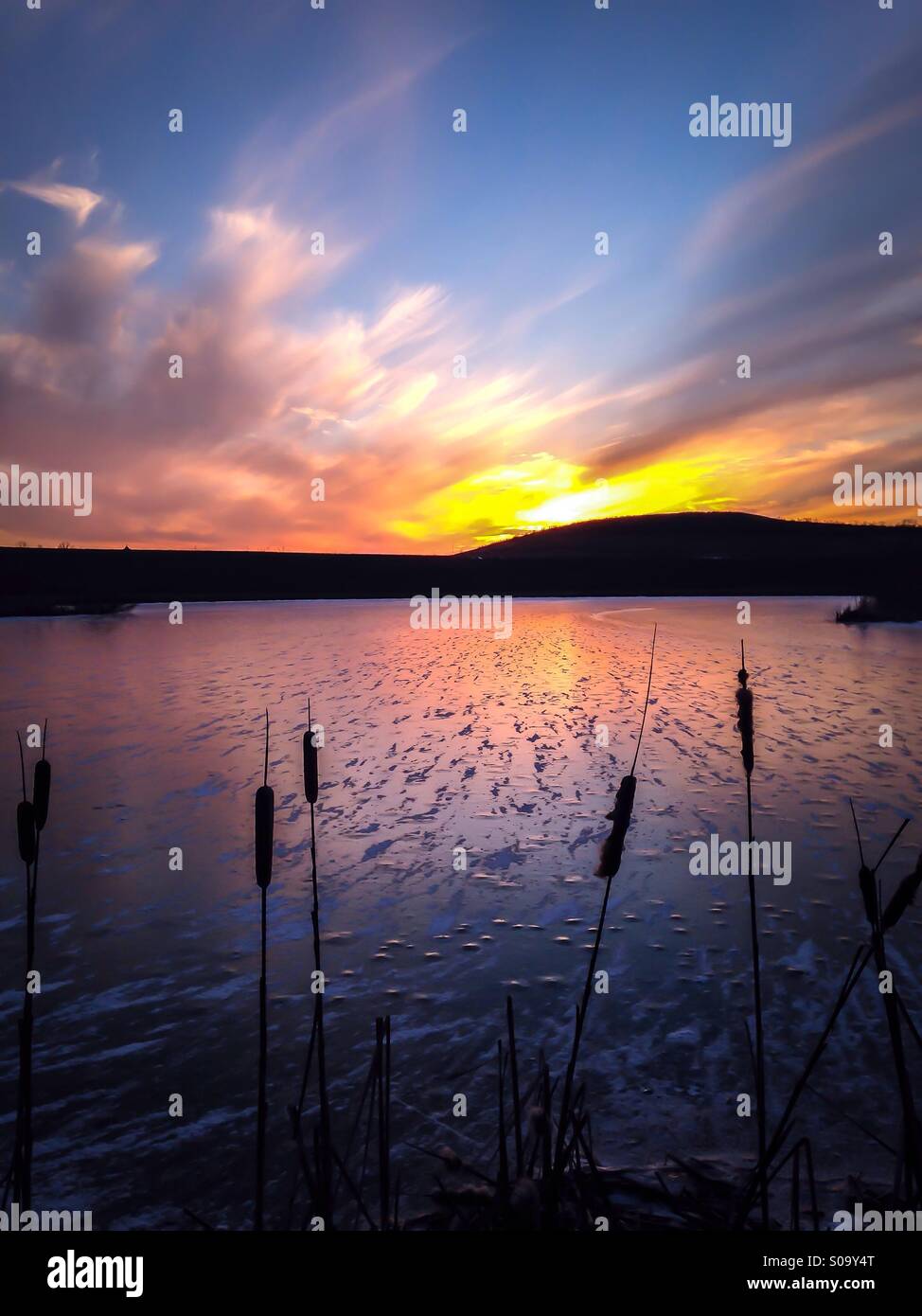 The sunset over a frozen lake (1). - Smartphone Captured Stock Image
