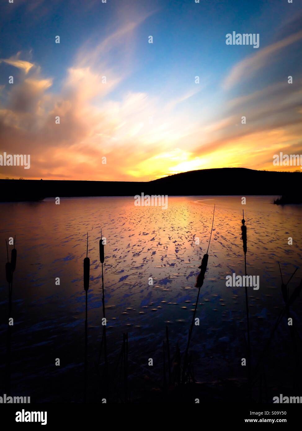 The sunset over a frozen lake (2). - Smartphone Captured Stock Image