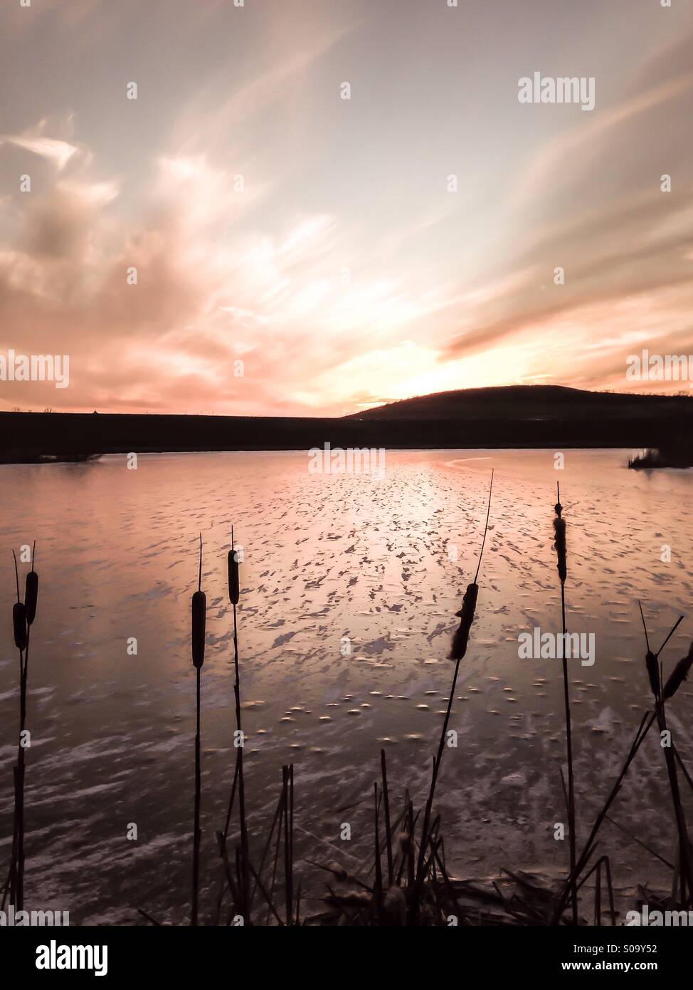 The sunset over a frozen lake (3). - Smartphone Captured Stock Image