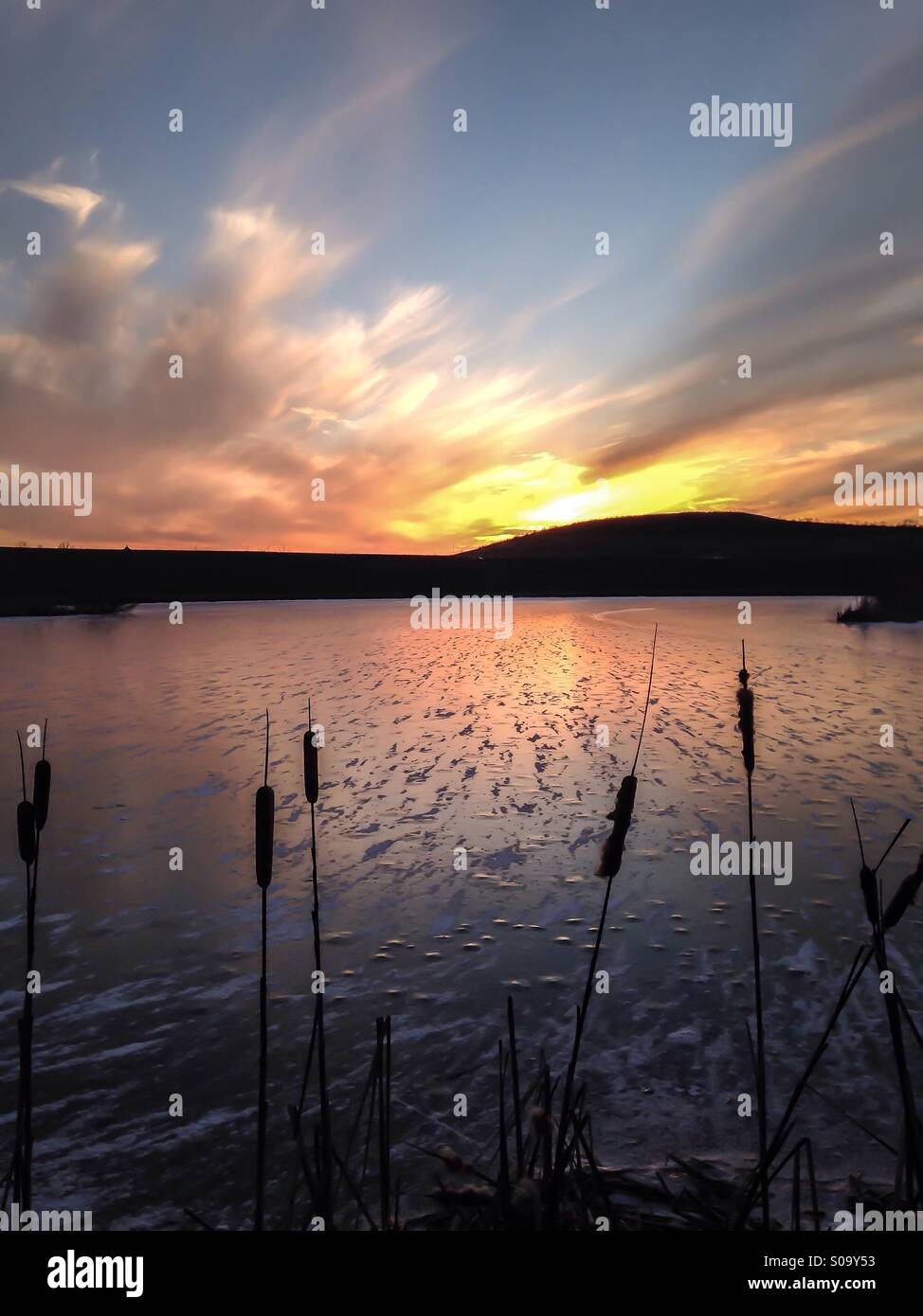 The sunset over a frozen lake (4). - Smartphone Captured Stock Image