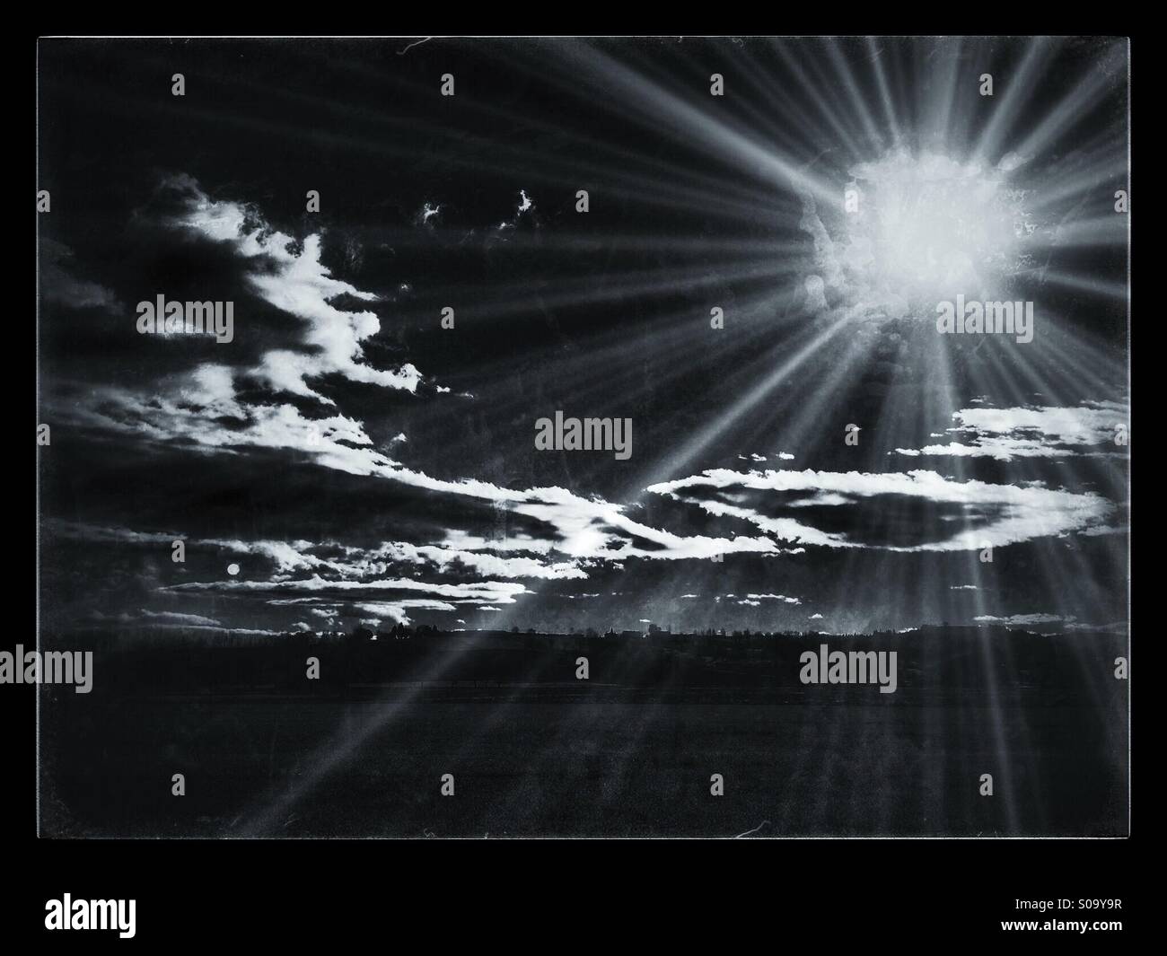 Black and white landscape with sun and clouds Stock Photo - Alamy