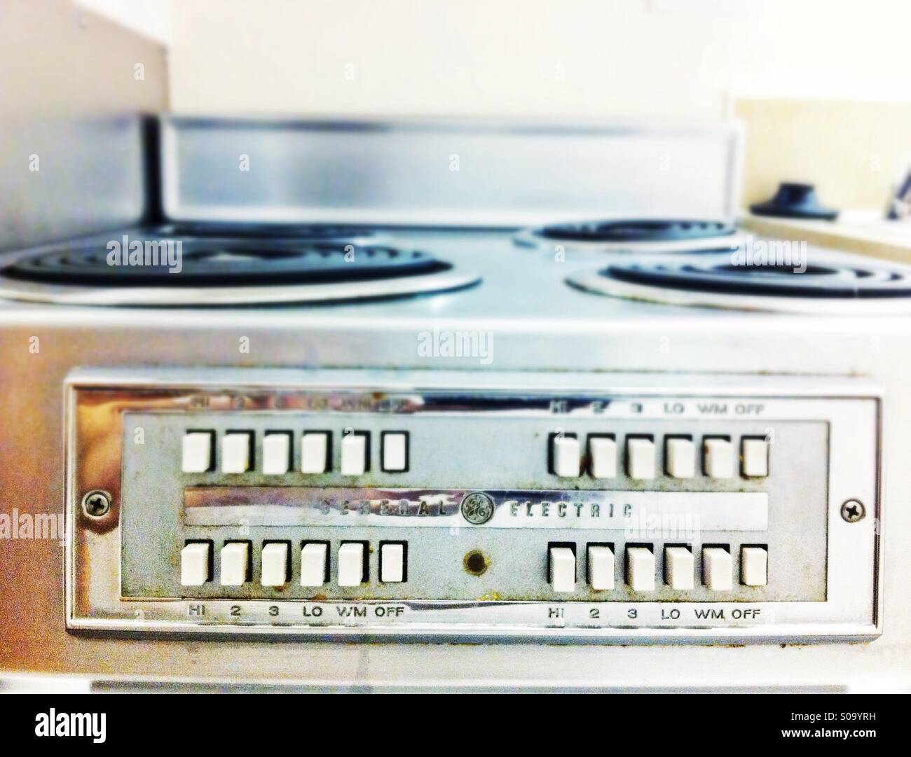 Vintage analog electrical oven control panel with push buttons - Smartphone Captured Stock Image