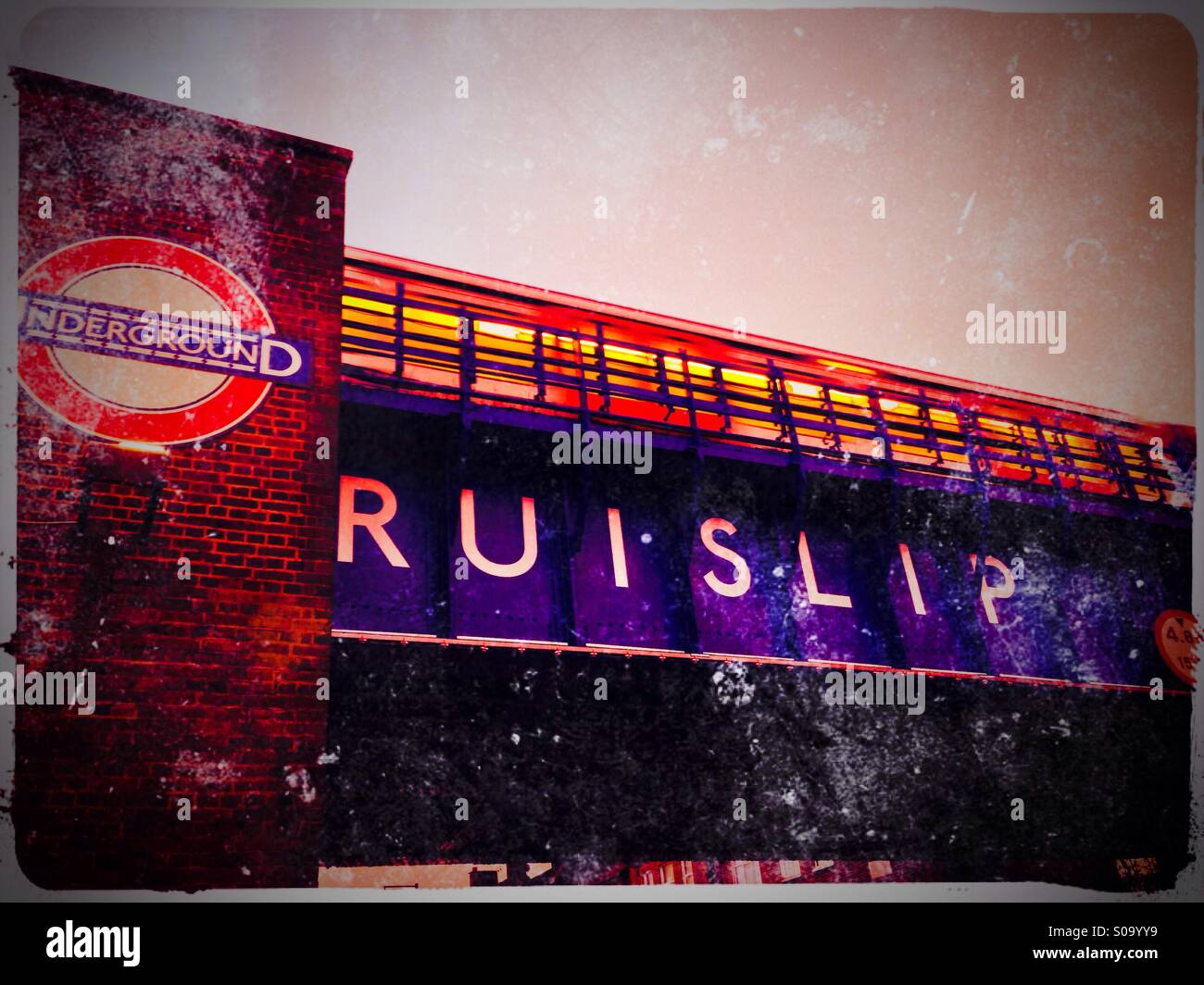 Railway bridge showing metropolitan line train, Ruislip Manor, London