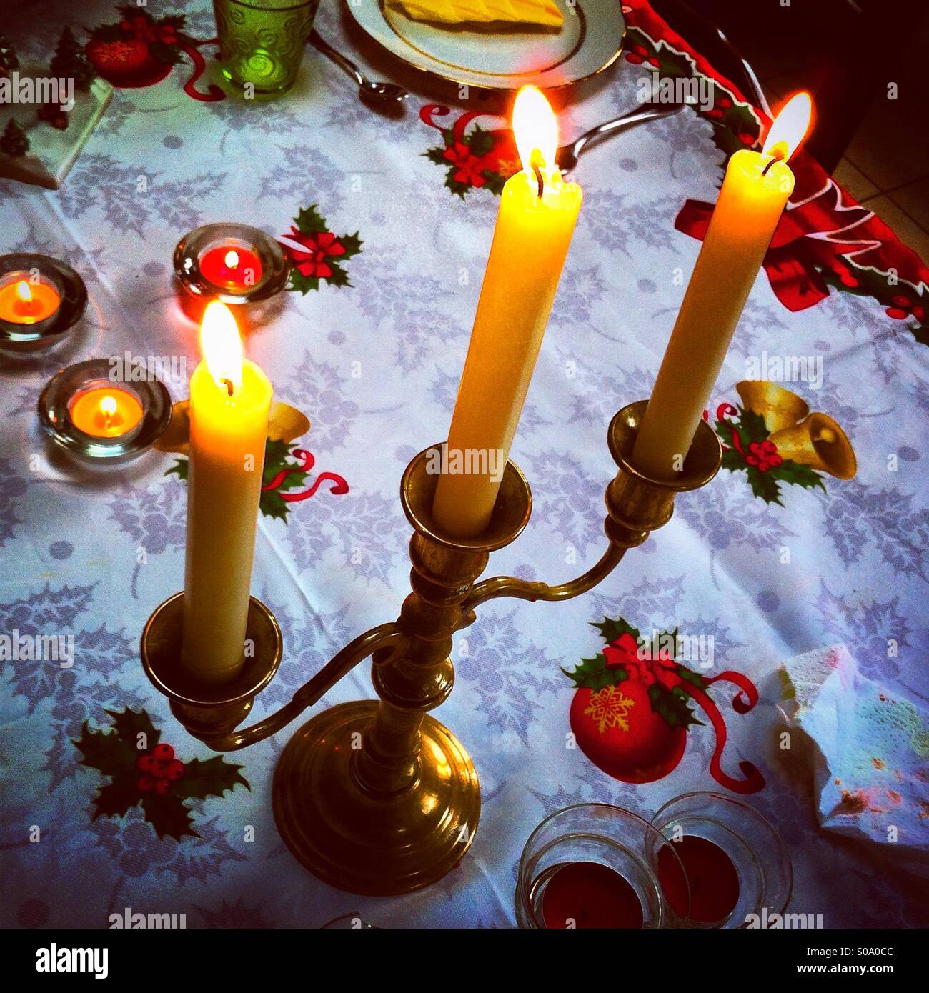 Three candles in a chandelier - Smartphone Captured Stock Image