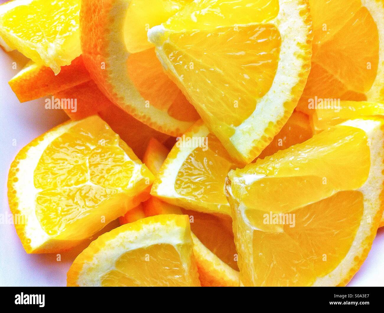 Pile of orange slices Stock Photo