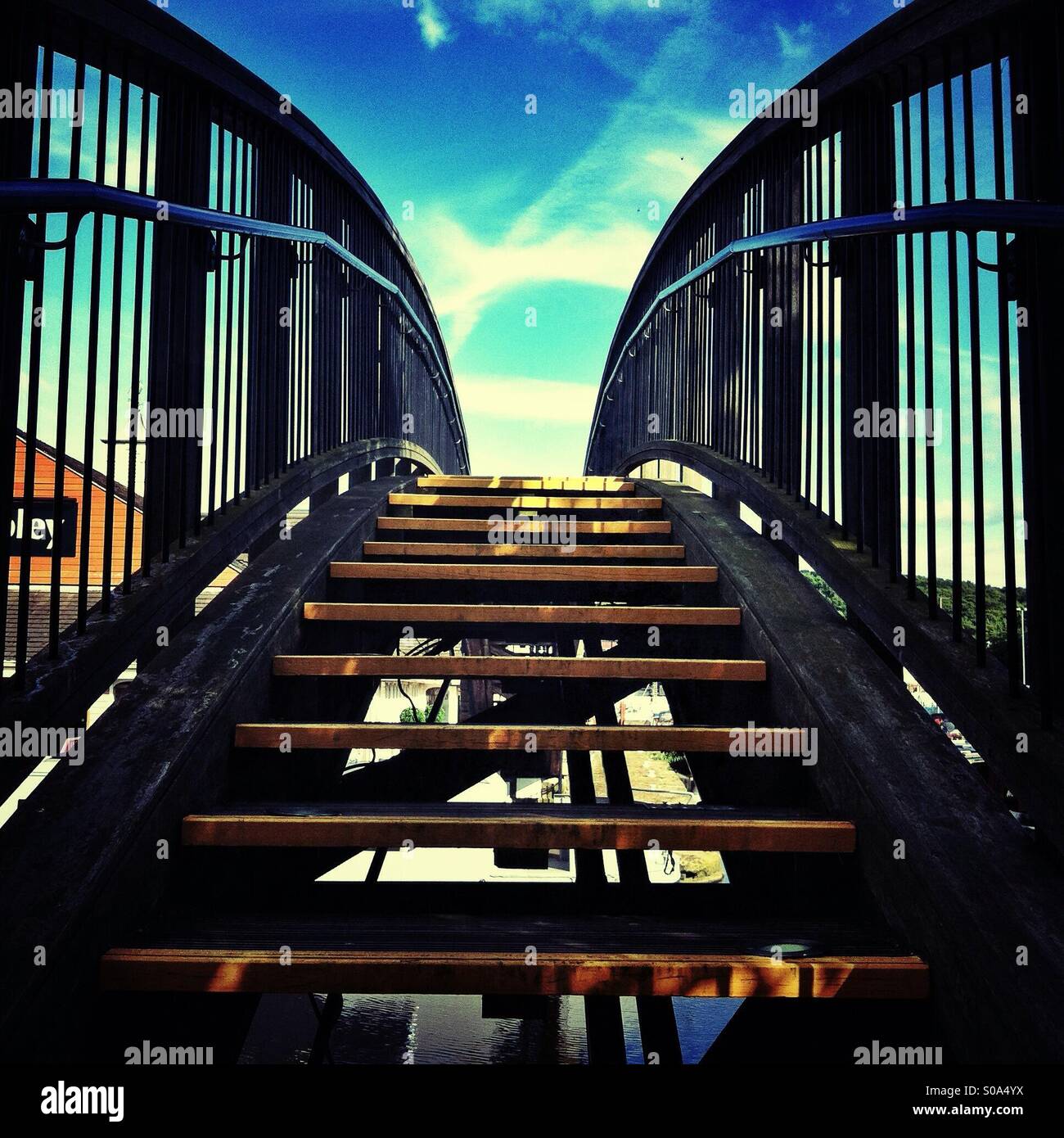 Low angle shot of arched footbridge. - Smartphone Captured Stock Image