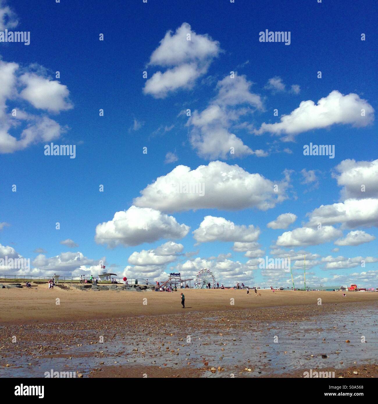 Dramatic cumulus clouds above Skegness beach Stock Photo
