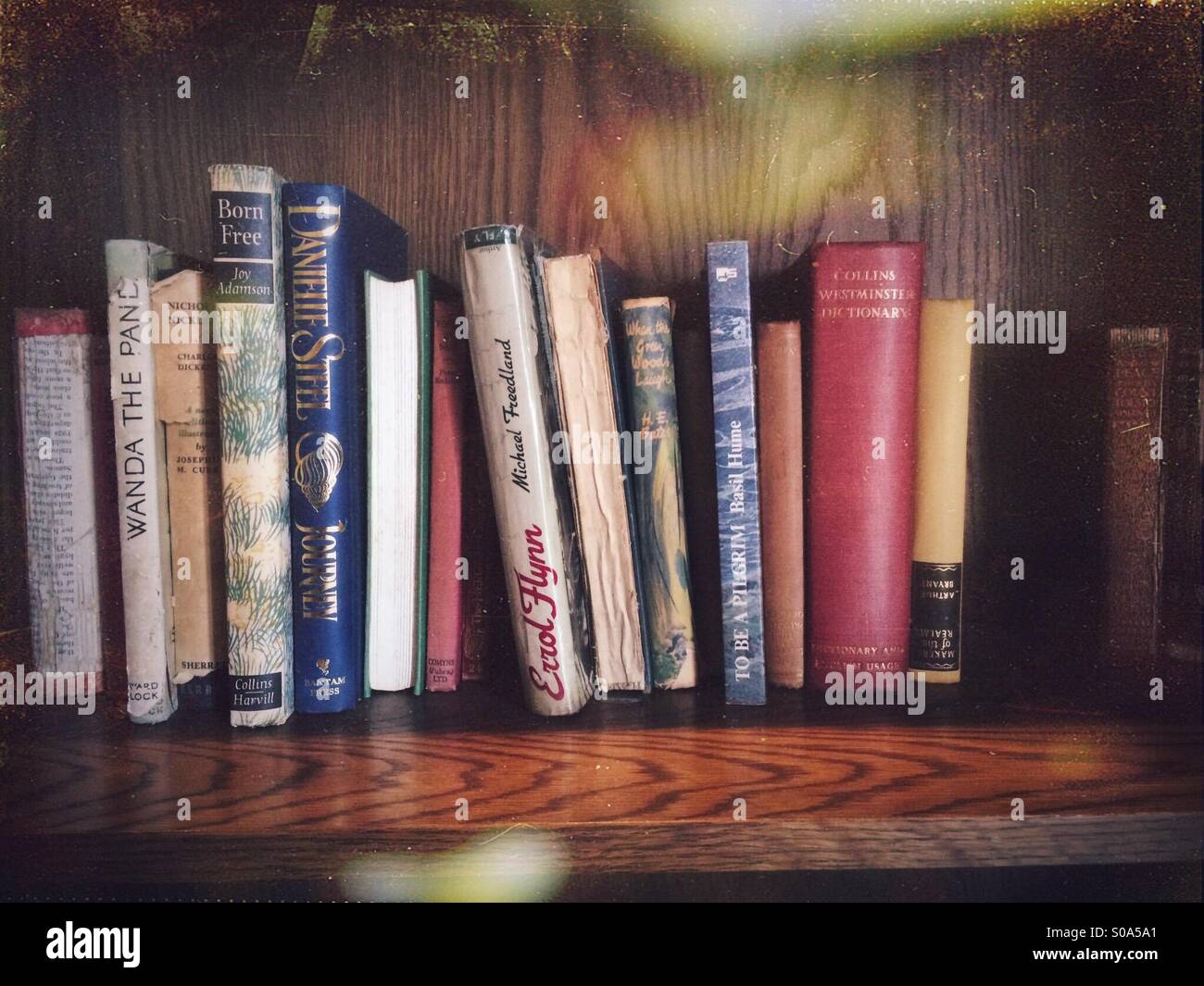 Bookshelf full of old hardback books - Smartphone Captured Stock Image