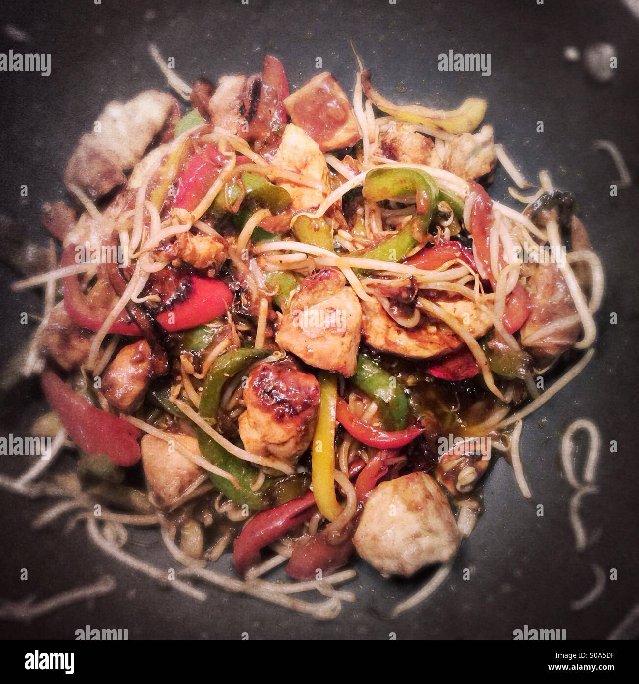 Stir fry cooking on a wok Stock Photo Alamy