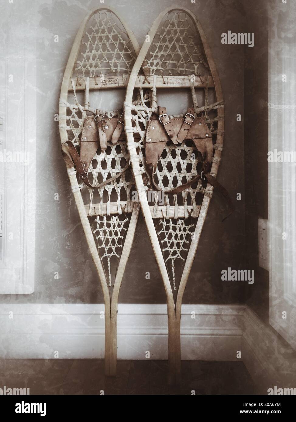 Vintage wooden snowshoes with leather bindings. Stock Photo