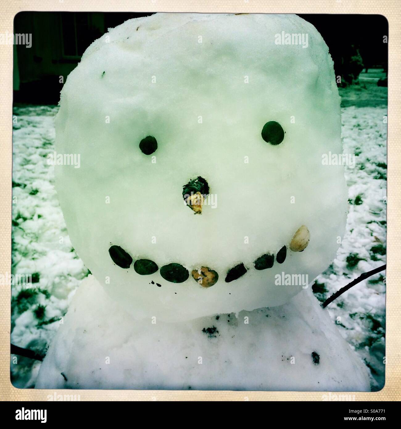 Snowman in one of the streets of Arnhem. Netherlands - Smartphone Captured Stock Image