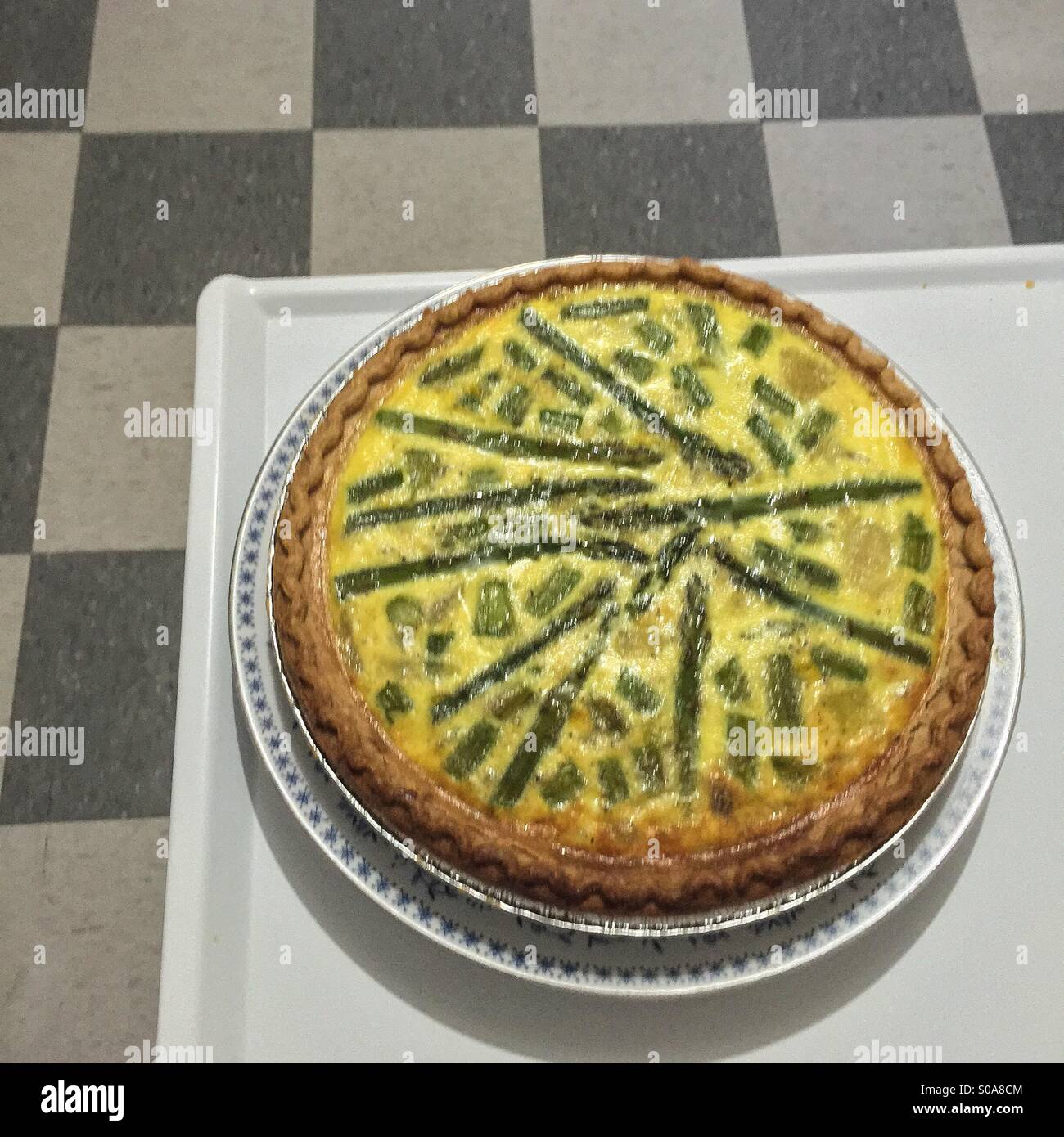 Asparagus quiche on counter Stock Photo