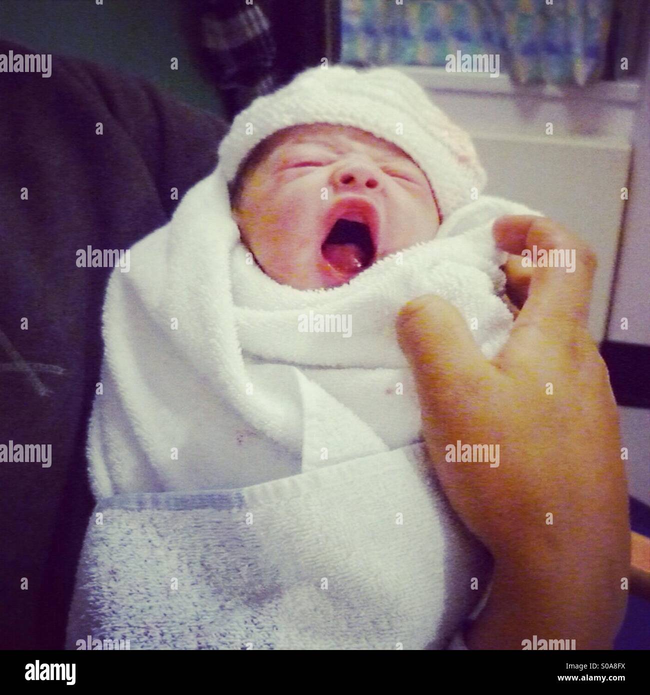 Newborn Baby Yawning Stock Photo