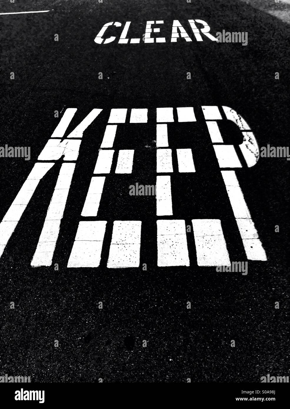 Keep Clear road sign in black and white - Smartphone Captured Stock Image