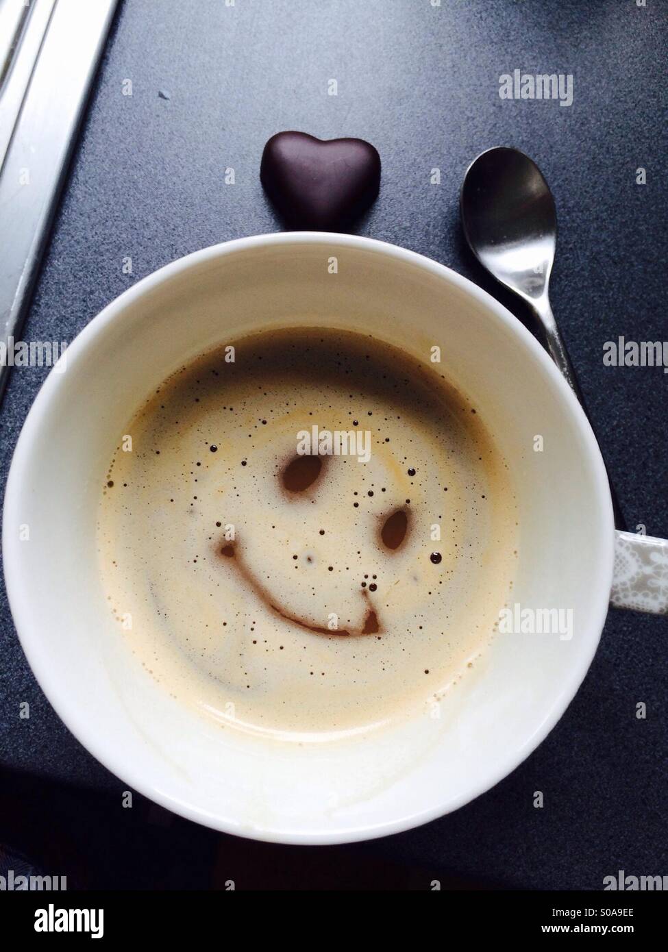 Coffee Cup with Smiley Stock Photo - Alamy