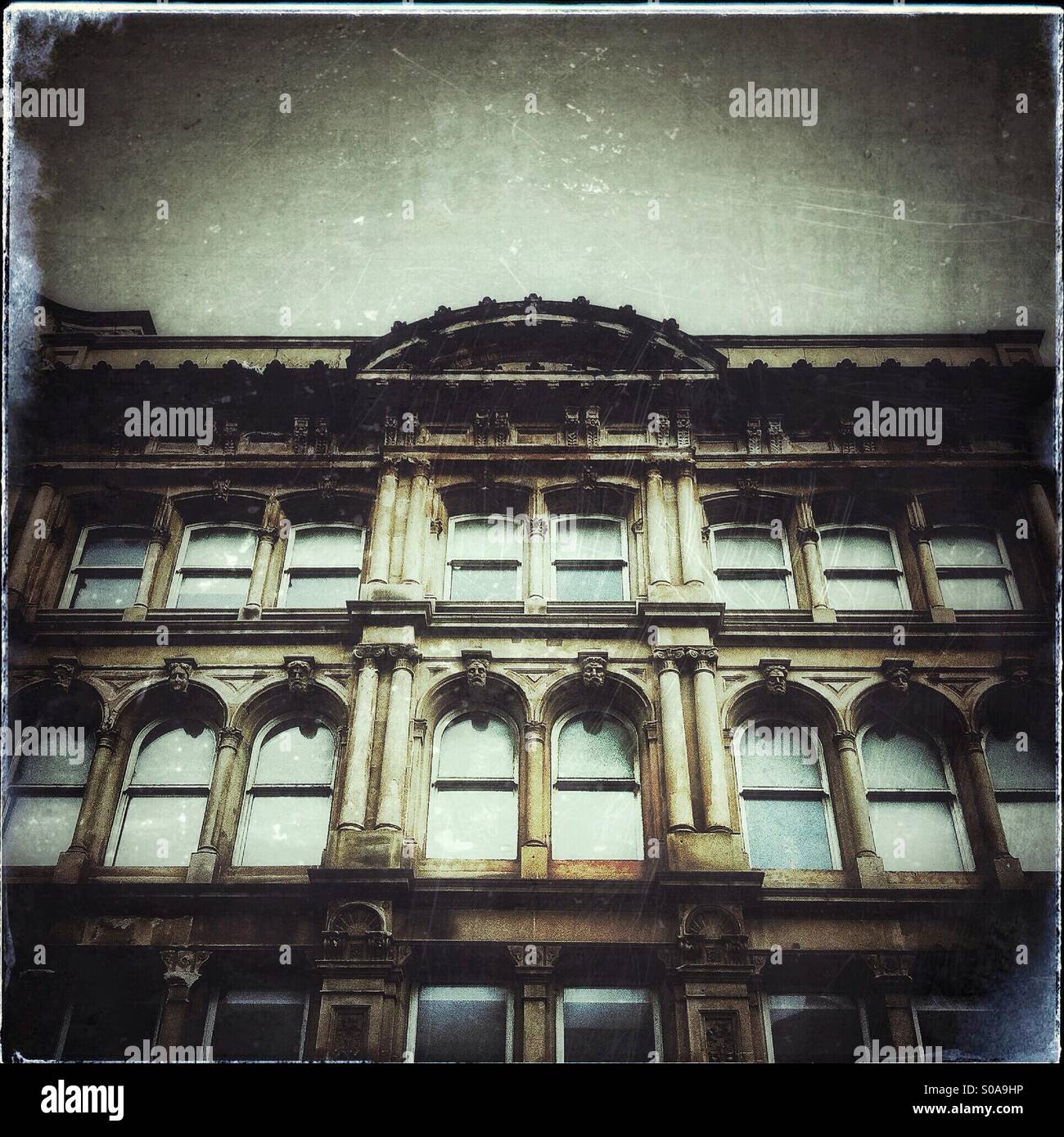 Atmospheric shot of Victorian building facade. - Smartphone Captured Stock Image