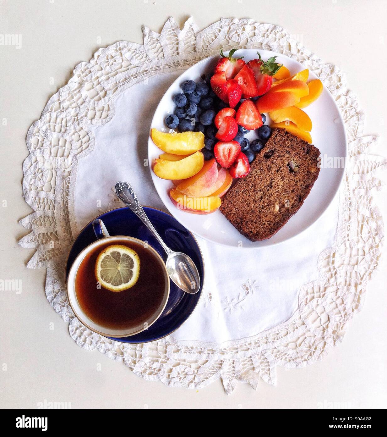 Tea time with freshly baked vegan banana bread - Smartphone Captured Stock Image