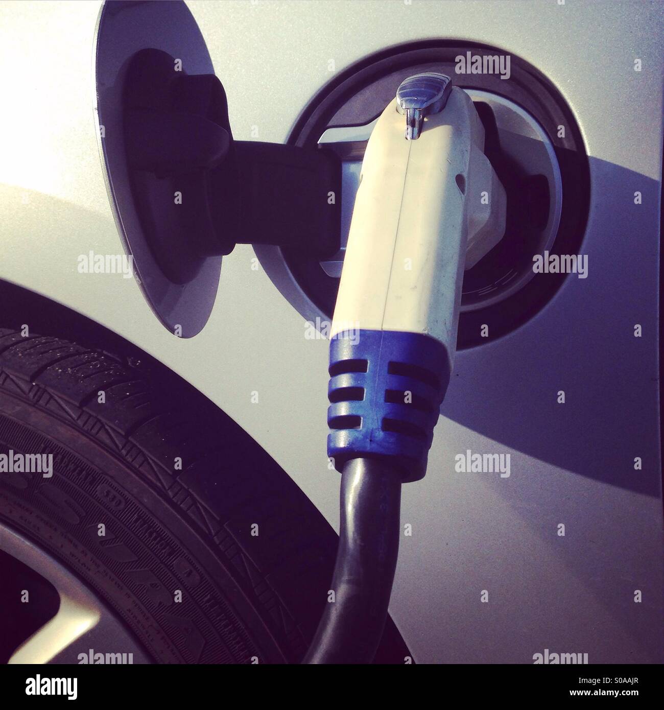 Electric car charging Stock Photo Alamy