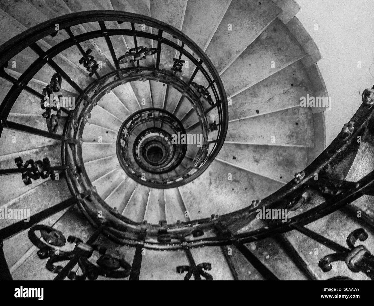 Spiral staircase, St Stephen Basilica, Budapest; in black and white. - Smartphone Captured Stock Image