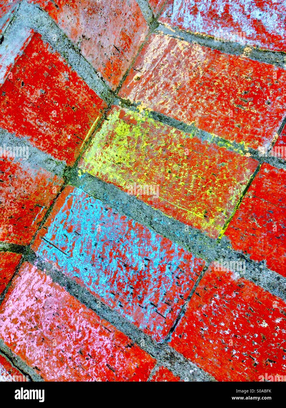 Colored chalk on red bricks - Smartphone Captured Stock Image