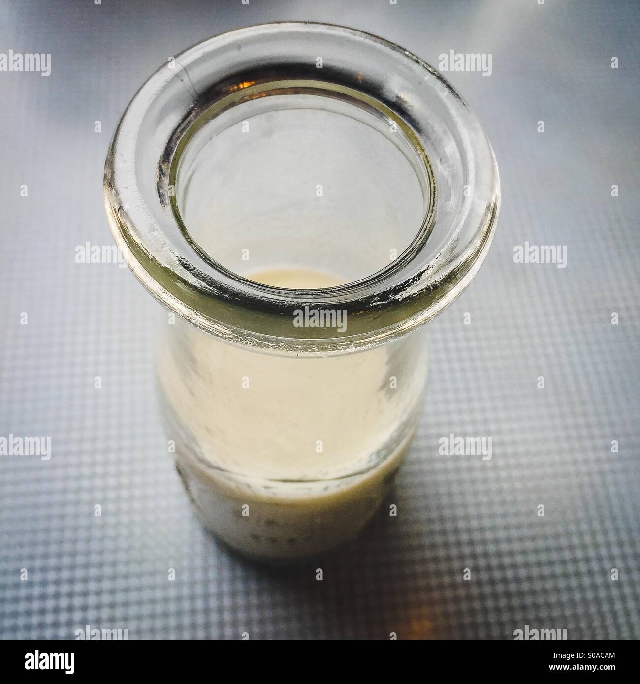 Milk in s bottle at a diner - Smartphone Captured Stock Image