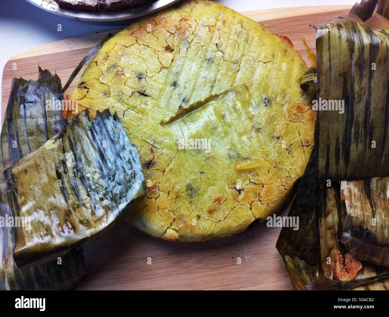 Traditional Philippine rice cake bibingka baked in banana leaves Stock Photo