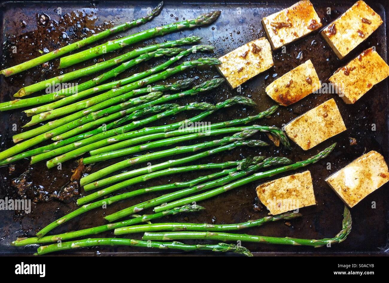 Asparagus and tofu on a baking tray - Smartphone Captured Stock Image