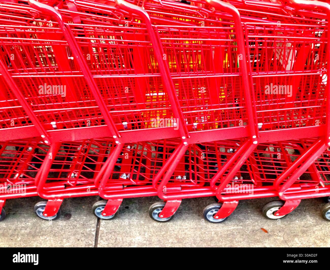Series of red shopping carts - Smartphone Captured Stock Image