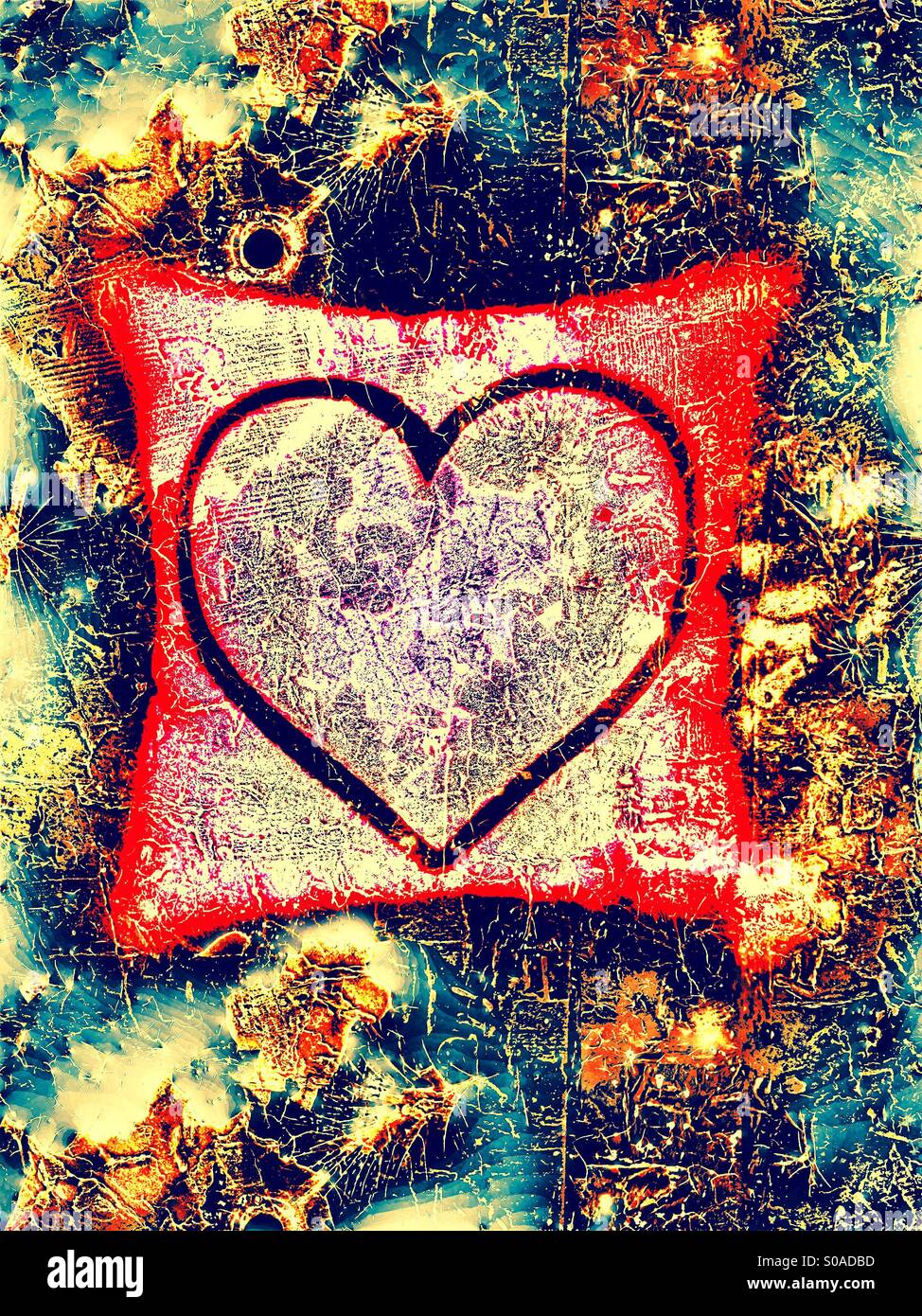 Red and black heart pillow with texture and grunge effects added for a semi-abstract look Stock Photo