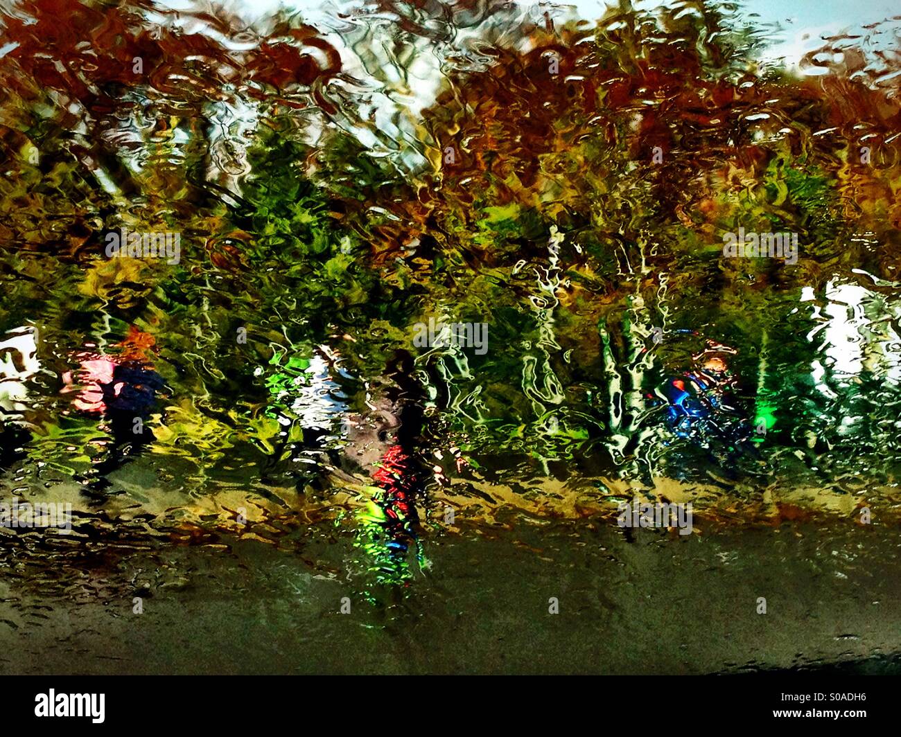 Children running in the rain - Smartphone Captured Stock Image