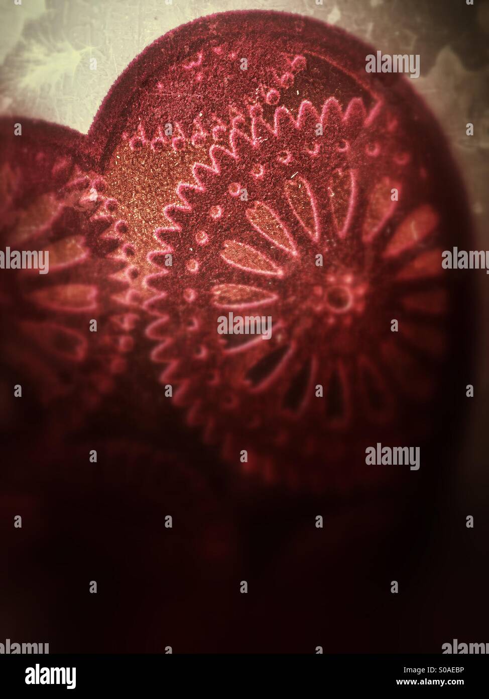 Blurred dark textured grungy semi-abstract heart for Valentine's Day Stock Photo