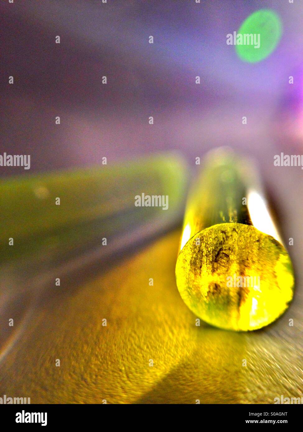 HDR view of Amber coloured acrylic rods - Smartphone Captured Stock Image