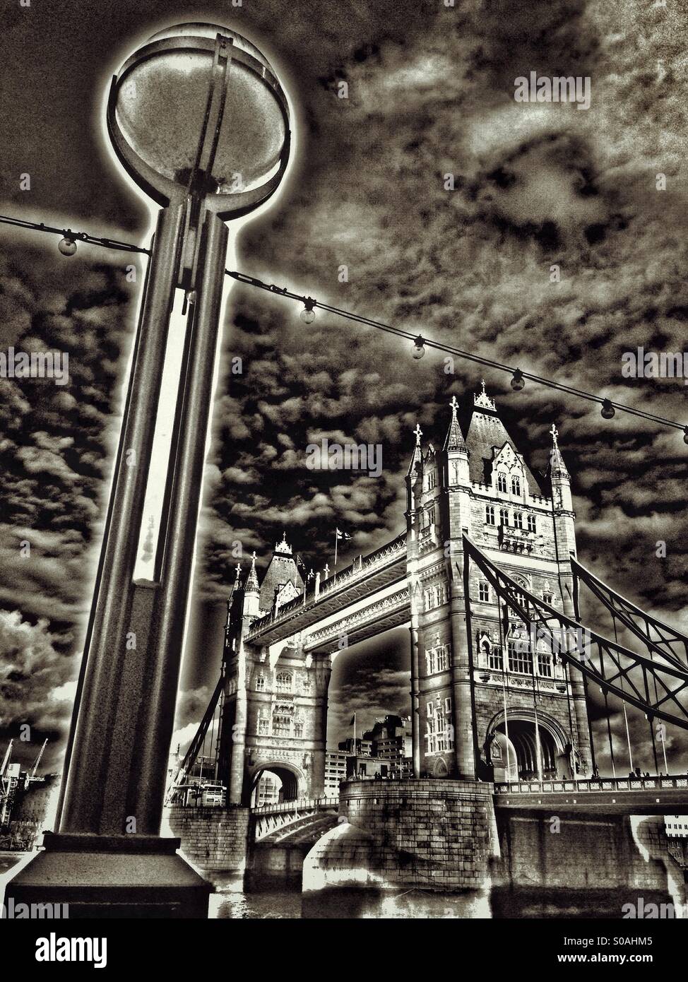 Tower Bridge, London, from the South Bank of The River Thames. An HDR Monochromatic view. Tower Bridge was built between 1886 & 1894. - Smartphone Captured Stock Image