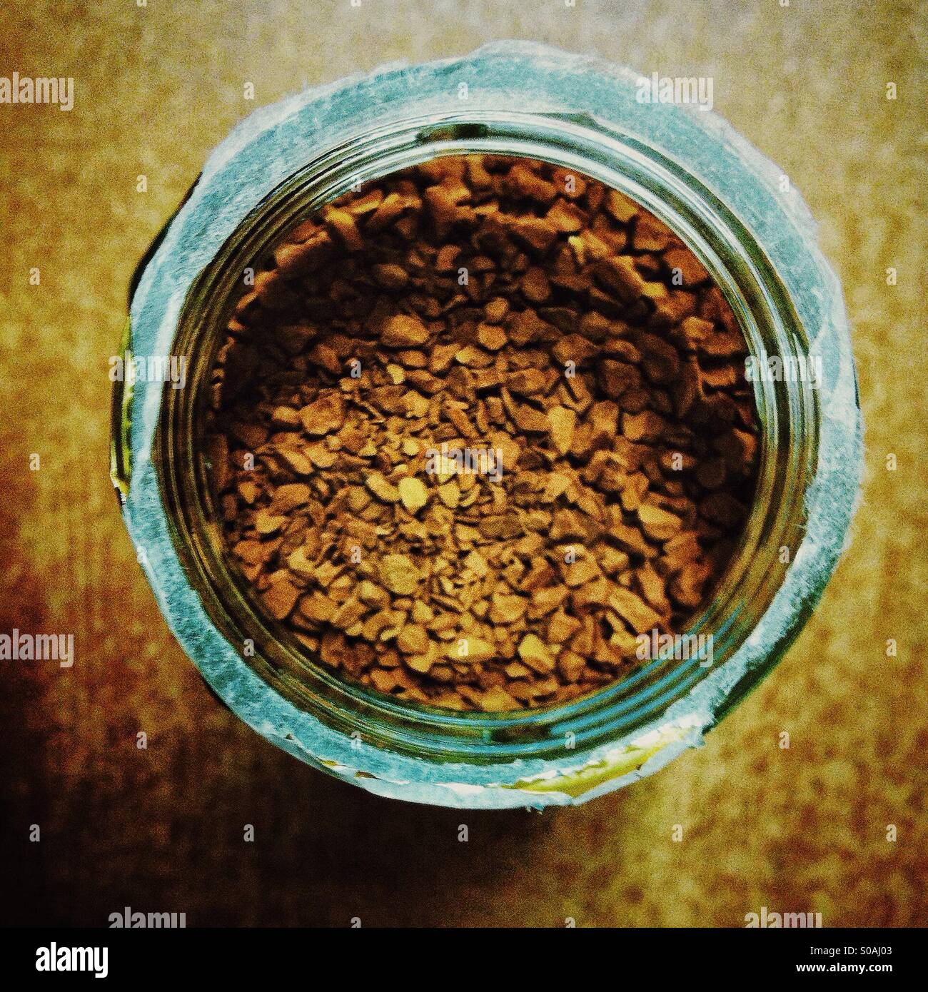 Overhead view of jar of instant coffee. - Smartphone Captured Stock Image