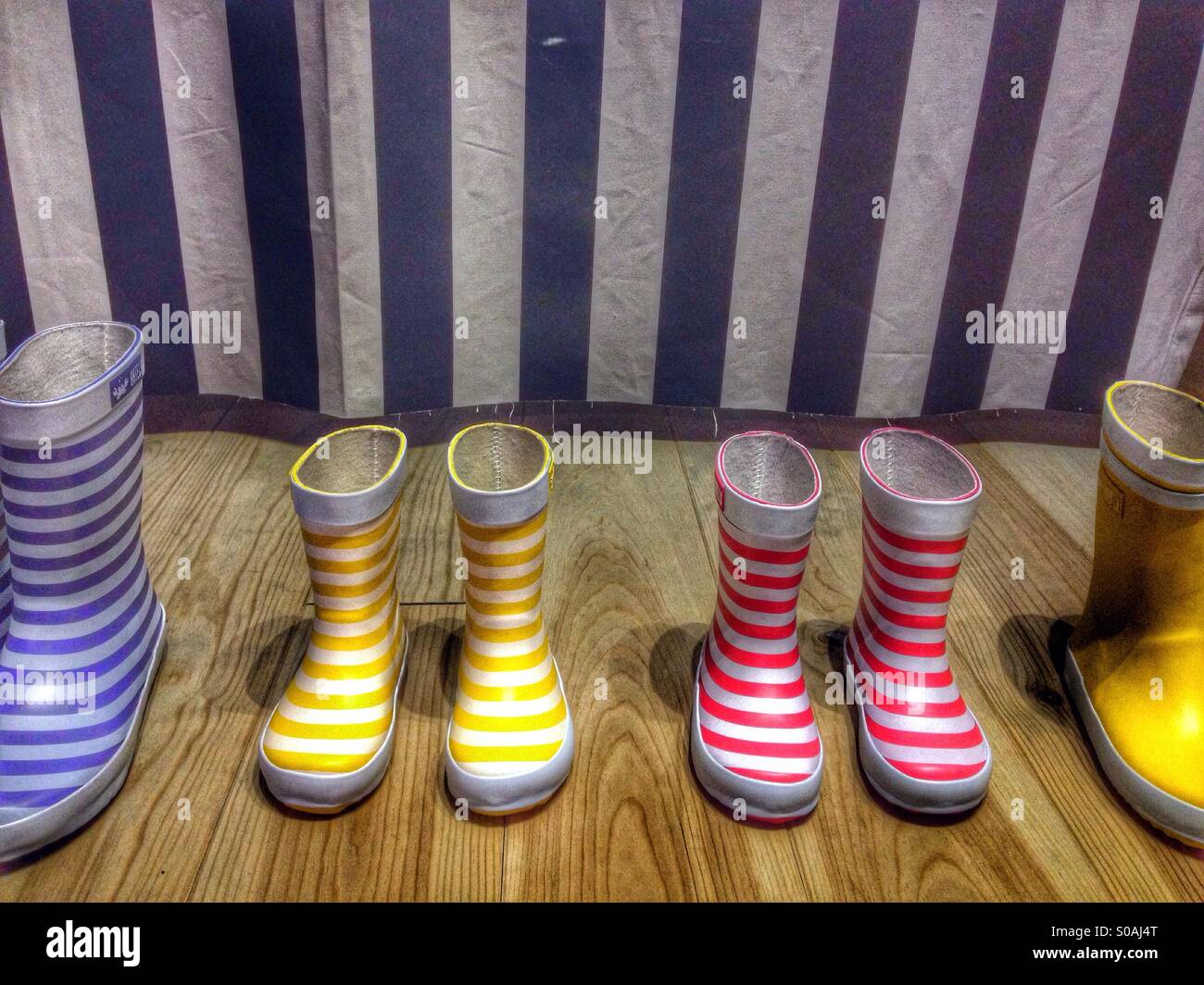 Striped colorful rubber boots - Smartphone Captured Stock Image