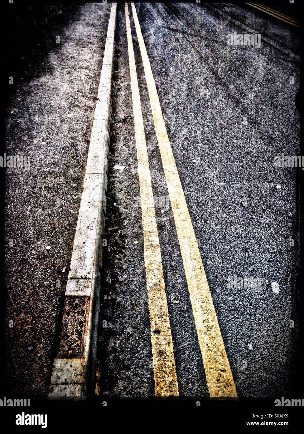 Double yellow lines - Smartphone Captured Stock Image