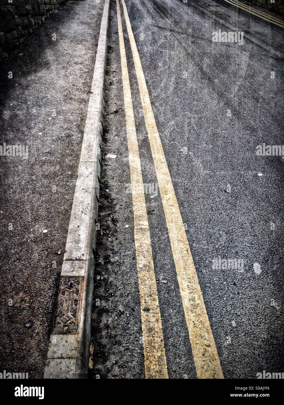 Double yellow lines - Smartphone Captured Stock Image