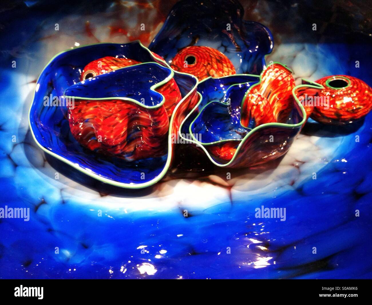 Red and blue blown glass sculpture in Seattle - Smartphone Captured Stock Image