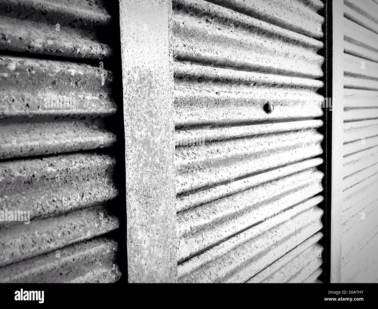 Shop front. Shutters Stock Photo - Alamy