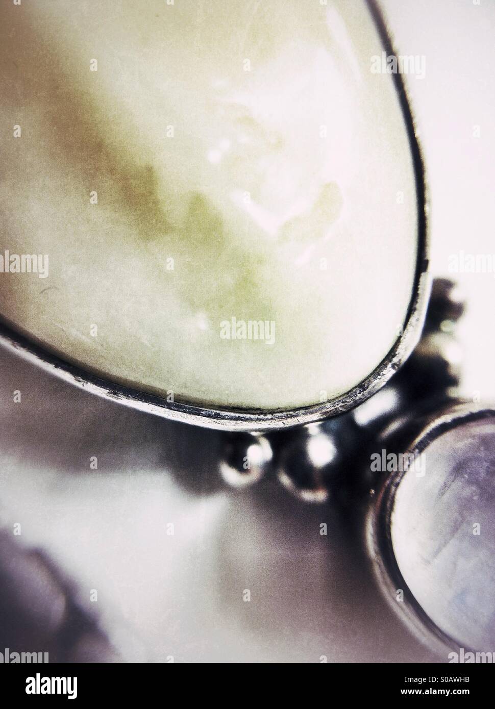 Macro image of a silver pendant - Smartphone Captured Stock Image