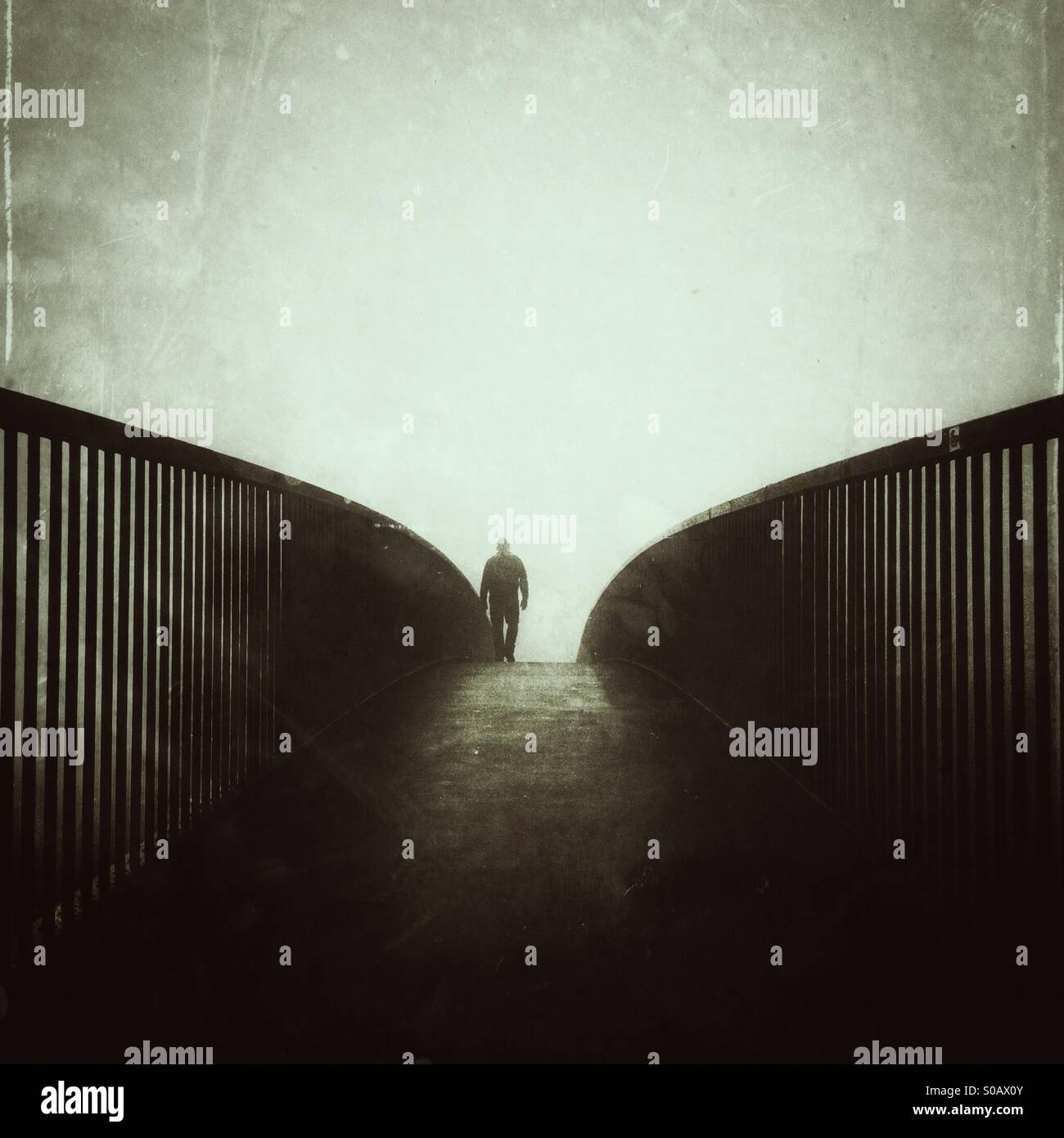 Man walking bridge footbridge hi-res stock photography and images - Alamy