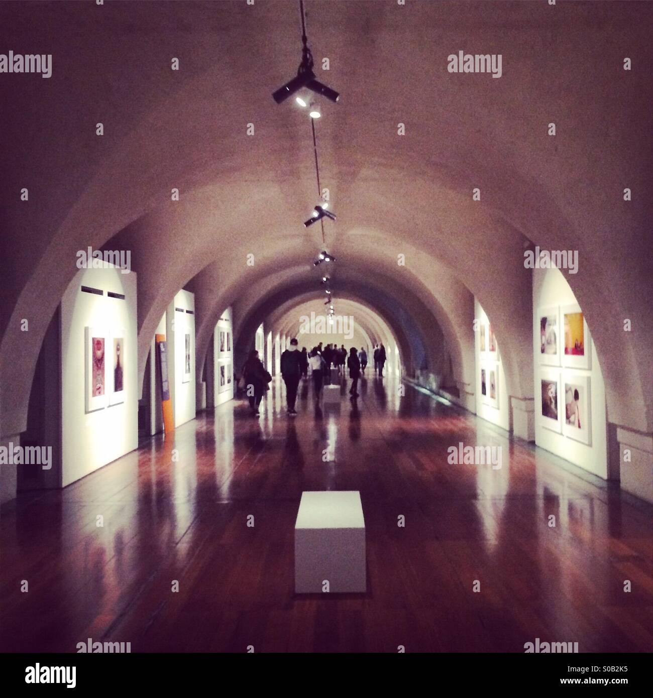 Lower level gallery at Somerset House in London during the Guy Bourdin exhibition - Smartphone Captured Stock Image
