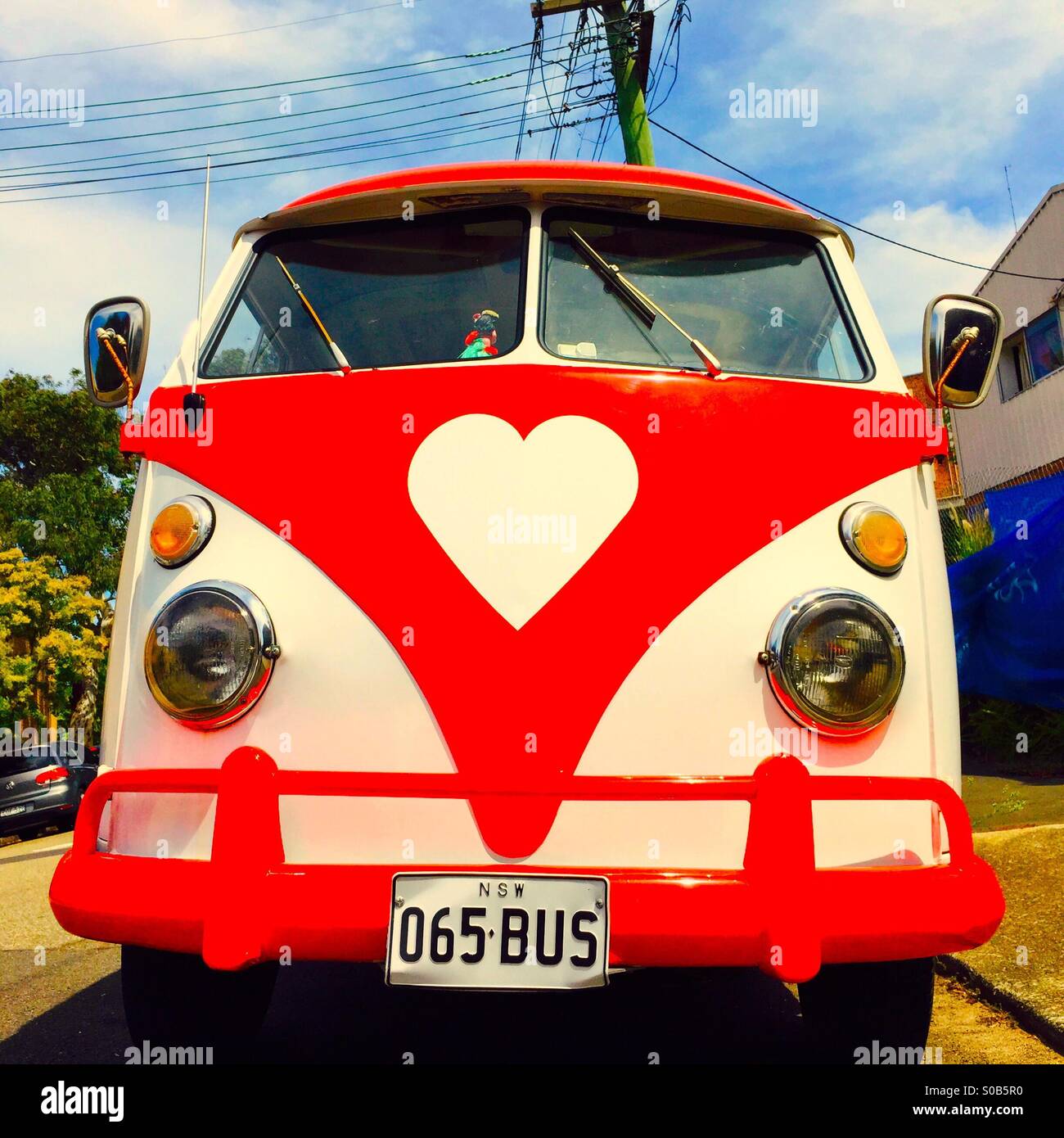 A vintage VW bus with a heart-shaped logo Stock Photo