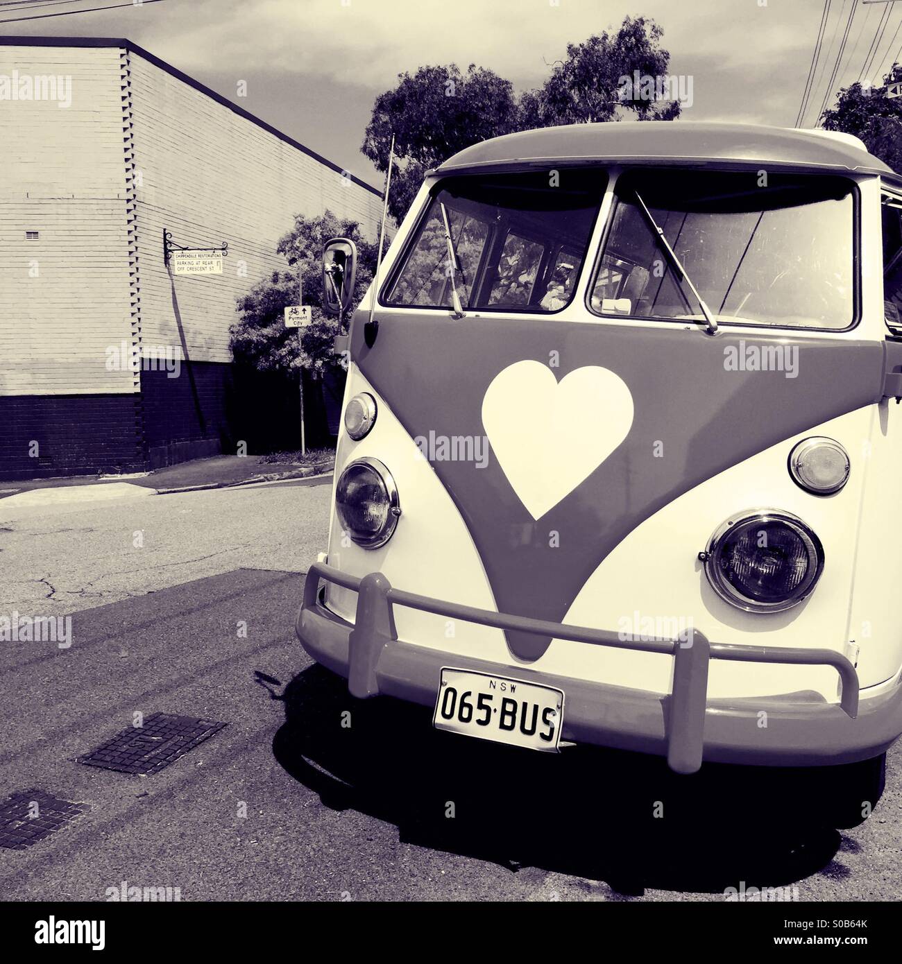 An old VW bus with a heart logo Stock Photo